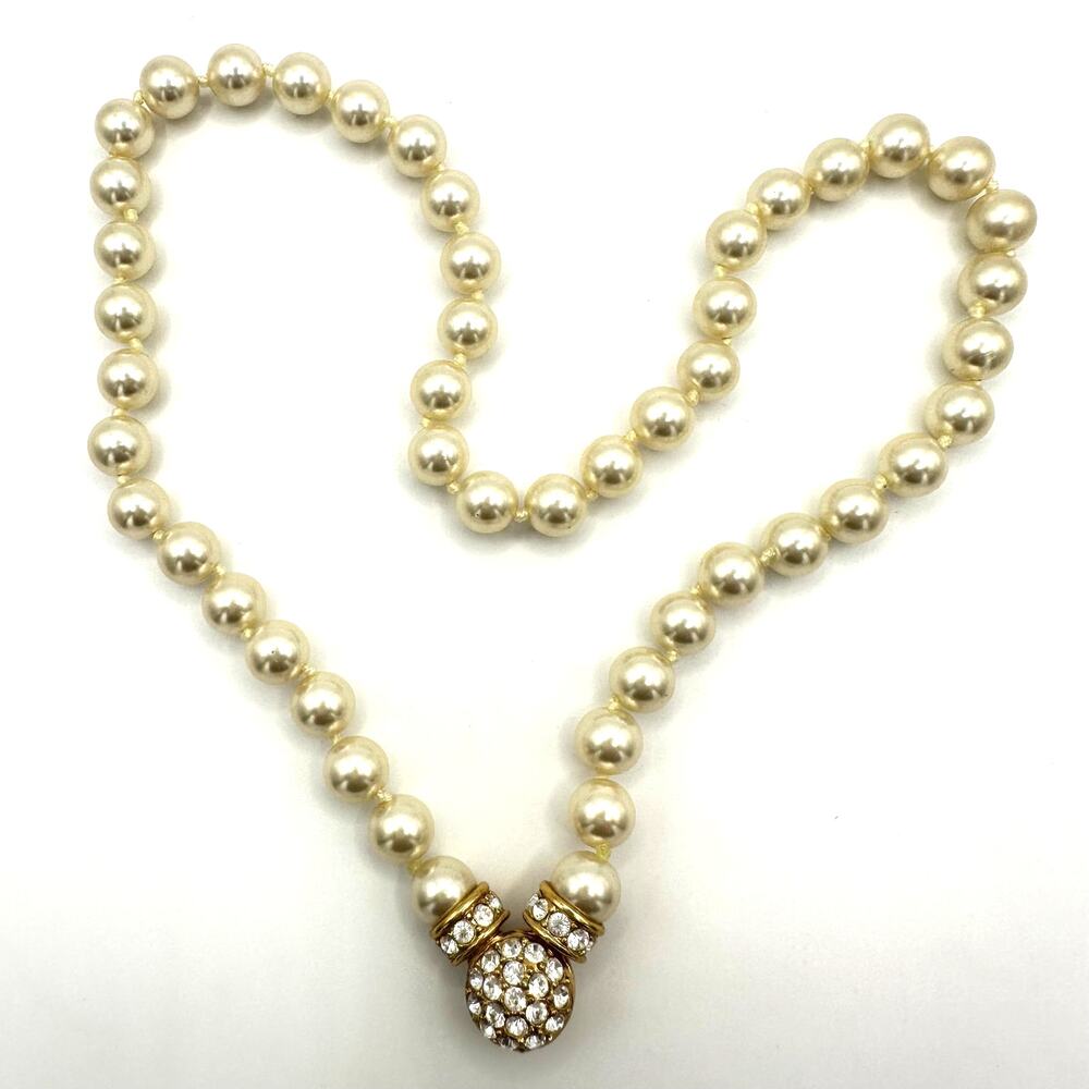 Nolan Miller gold tone white 8mm glass faux pearls rhinestones knotted necklace